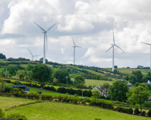 Wind turbines over farmland in Ireland