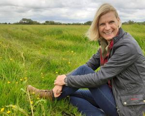 Pippa Hackett in field of clover