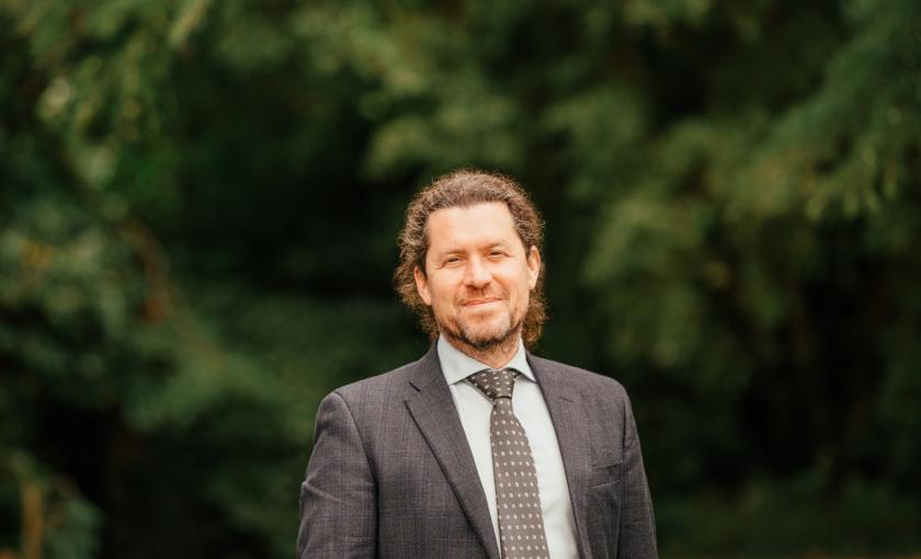 Profile photo of Steven Matthews TD for Wicklow, trees in background