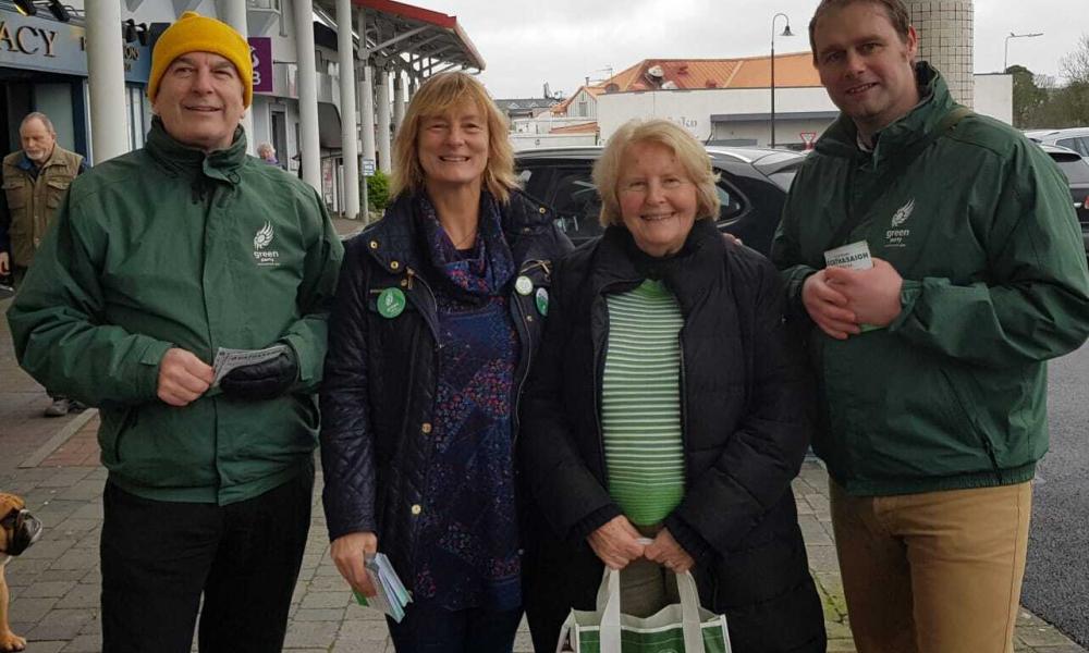 Green Party representatives Grace O'Sullivan MEP and Marc Ó Cathaisagh TD are accompanied by local group members during a canvass in the 2020 General Election