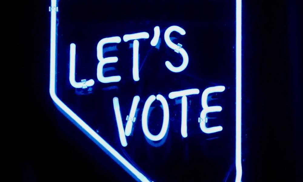 Neon sign 'Let's Vote'