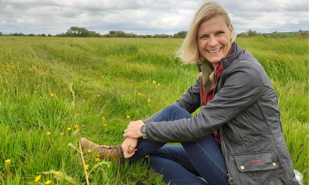 Pippa Hackett in field of clover