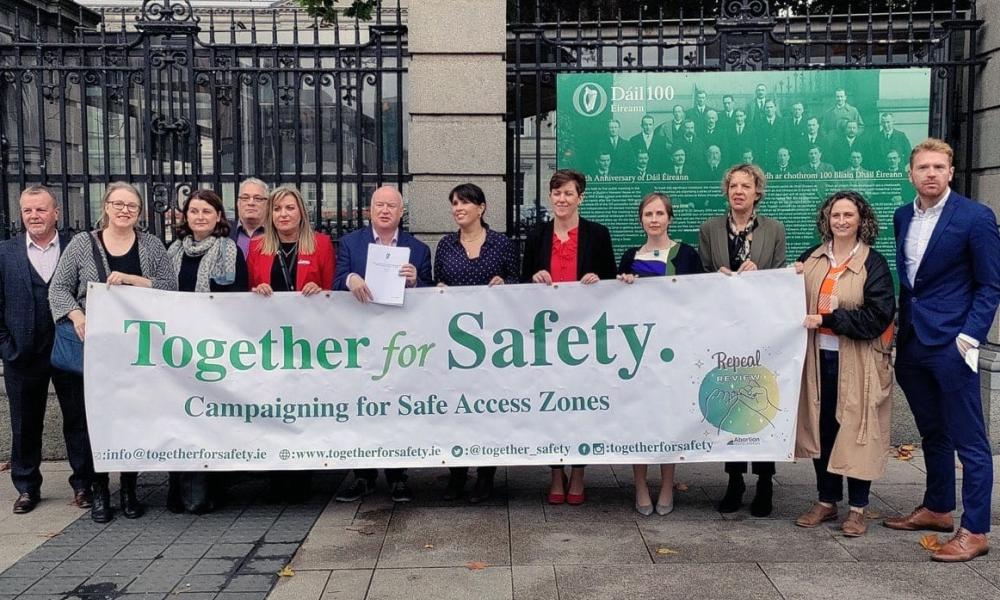 Cross-Party Senators support the Seanad Safe Access Bill drafted by Together for Yes outside Government Buildings