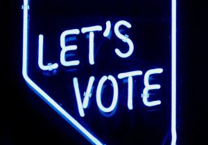Neon sign 'Let's Vote'