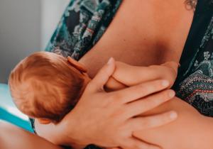 Woman breast feeding her baby