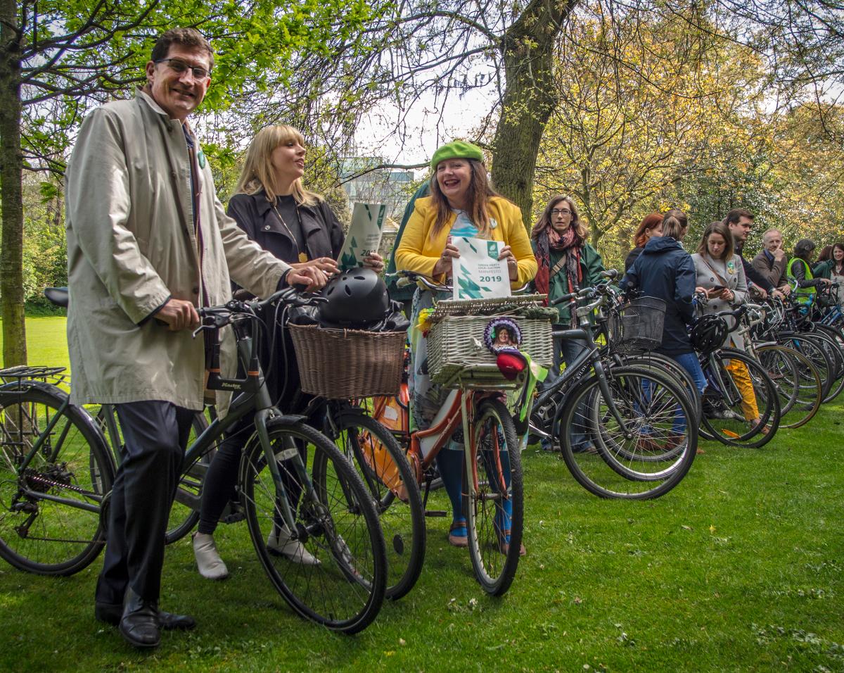 Green Party leader Eamon Ryan with Claire Byrne, Donna Cooney and other local election candidates on their bikes in 2019